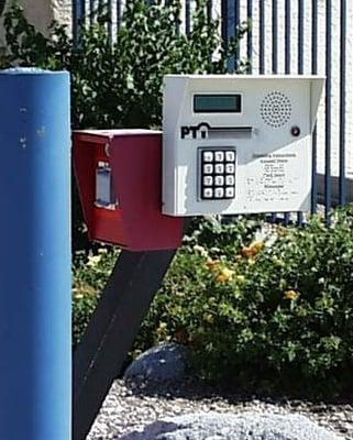 Keypad for gate and to activate/deactivate alarm in unit.