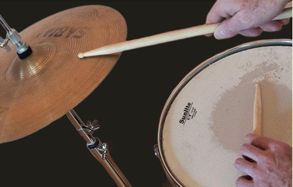 Learn to kick a beat and be part of a band playing drums at 
 B Sharp Studio.