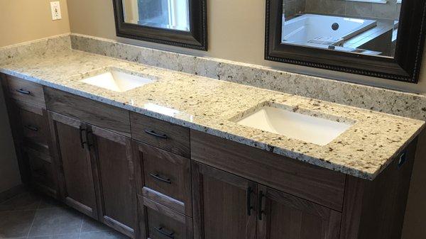 Masterbath new countertop with undermounted sinks.