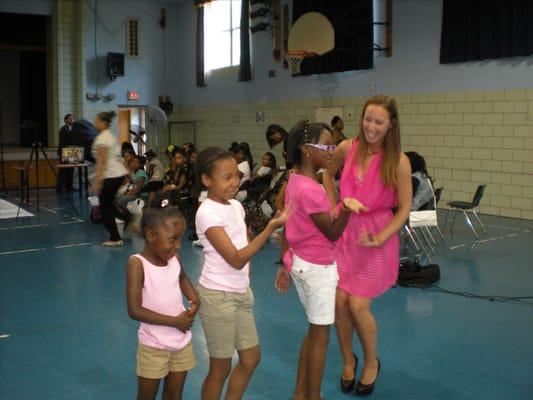 Our modeling instructor Willow Star working with girls in the REACH Leadership Program