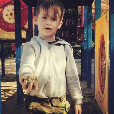 Bennet making the most of the wet sand in the park.