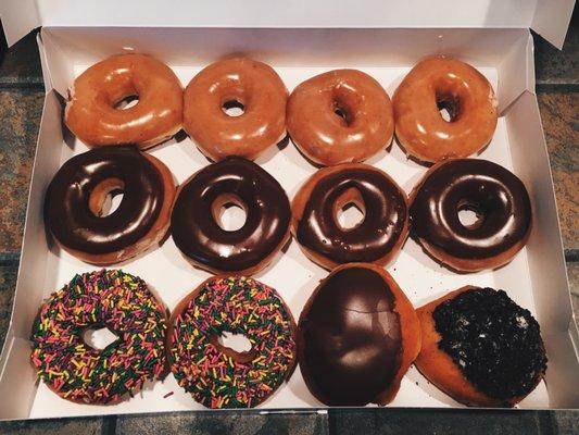 Original Glazed, Chocolate Glazed, Chocolate Glazed with Sprinkles, Filled Chocolate Glazed, Oreo Donuts (Left to Right)