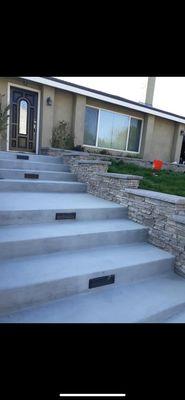 Cement steps and stone wall