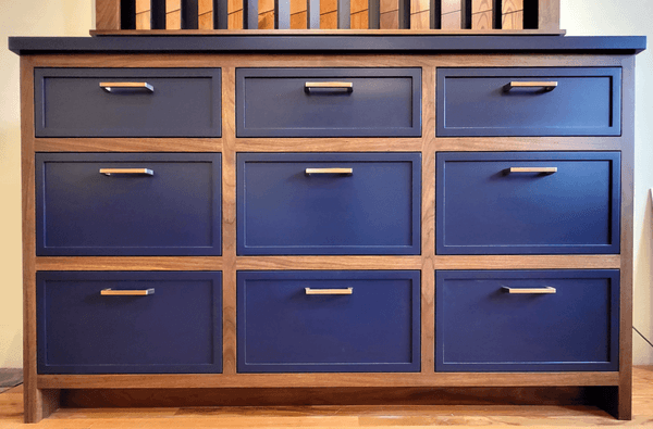 Walnut Inset face frame with painted fronts and countertop.