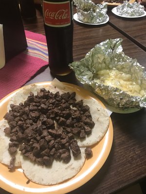 Arrachera taco plate, baked potato and bottled Coke