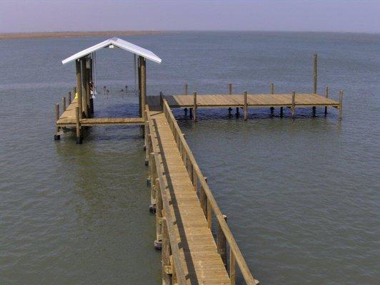 Dock decking, pilings, and boathouse materials