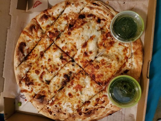 Chest garlic bread. Thicker, chewy crust, good amount of garlic with pesto on the side.