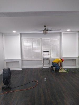 Floors cabinets trims and paint.