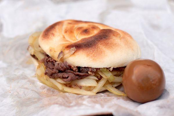 #1 Lamb flatbread sandwich 羊肉夹馍 ($6) and #12 tea egg 茶鸡蛋 ($1.50) - good. Tea egg is very salty.