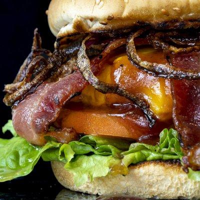 Big BBQ Bacon Burger - 1/3 lb. burger with BBQ sauce, bacon, crispy onions, melted cheddar cheese, lettuce, tomato, and mayo, on toasted bun