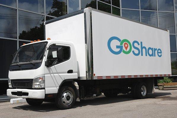 Box truck outside of a commercial building