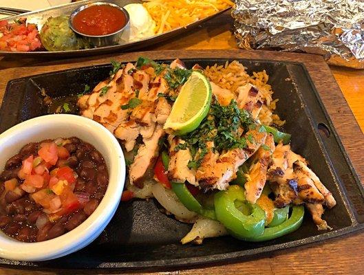 Grilled Chicken Fajitas - Ask for corn tortillas to cut some calories!