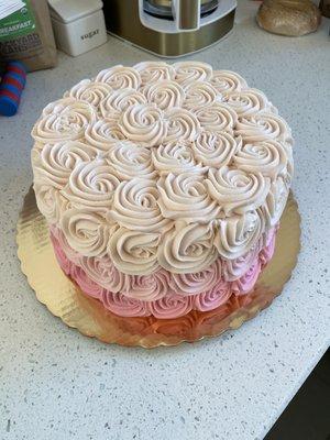 Cannula cake with pink ombré buttercream rosettes