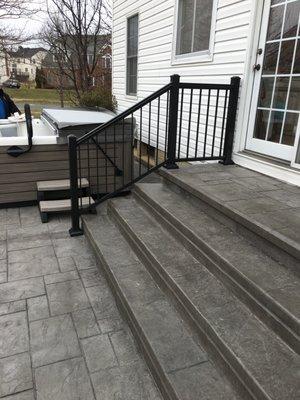 Stamped concrete patio and Aluminum railings