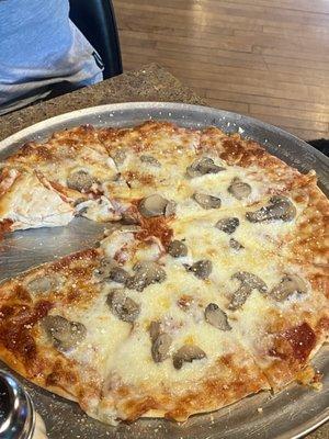 Pepperoni pizza with mushrooms