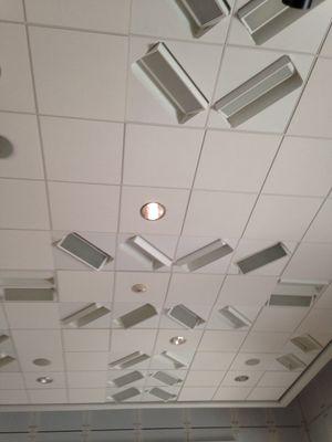 Install recessed fluorescent light fixture in conference room in America university