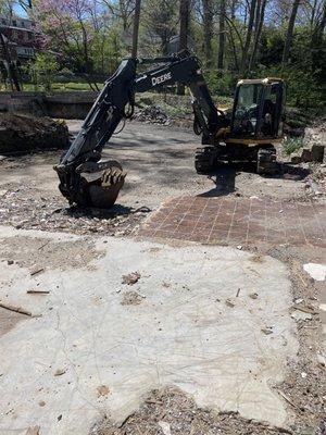 Finishing up demolition of a old house to make way for a new home