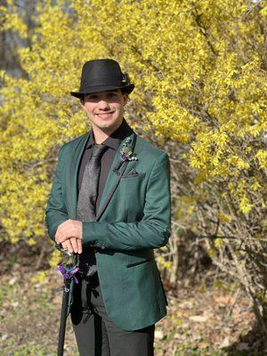 Hat boutonnière and cane all done by Carriage house