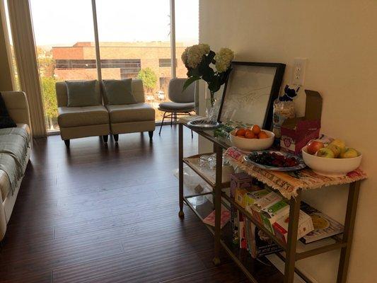 Welcome! Reception area filled with healthy snacks and great reads