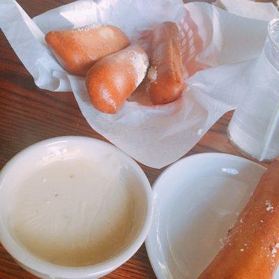 Cheesy breadsticks - deep fried, filled with cheese, served with queso. Heaven.