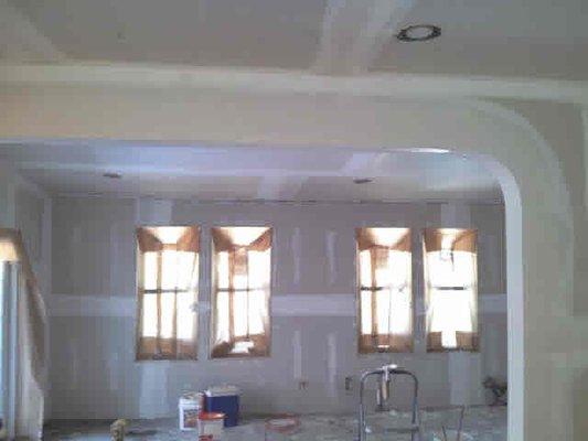 Drywall installation with custom corners, wall & door openings. All our work is guaranteed.