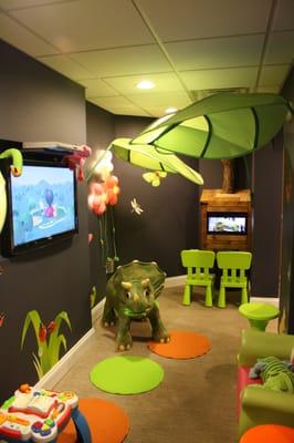 The Kid's Cove is an area for the children to have fun and relax before their appointment!