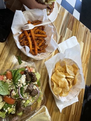 Sweet potato fries steak tip salad  potato chips