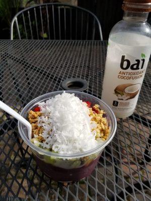 Coconut, granola, kiwi, & strawberry yummy!