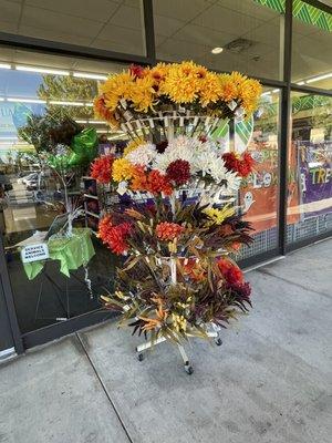 Flower stand outside the store.