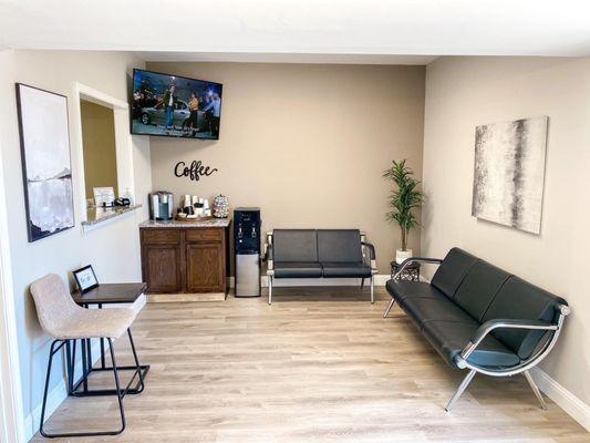 Our comfortable waiting area complete with coffee bar and free, easily accessible WIFI!