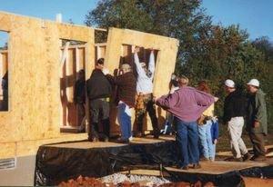 Families qualify for homes by contributing at least 300 hours of sweat equity.