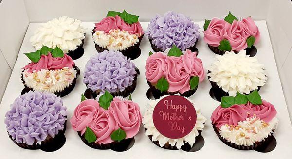 Assorted floral buttercream cupcakes for Mother's Day, visit our website to place your order.