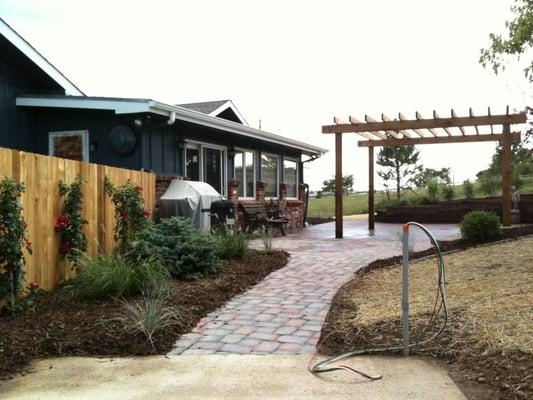 Customer wanted a beautiful outdoor entertainment area with pavers and a hot tub pad.