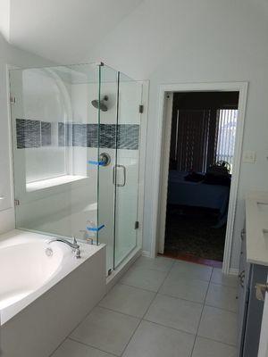 Frameless shower install. Also did vanity, fixtures and flooring on this remodel.