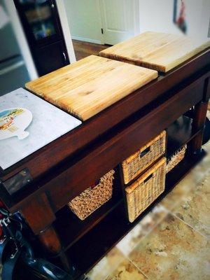 Kitchen Island with storage under the cutting boards.  1 Marble slab for rolling out cookie or pizza dough.