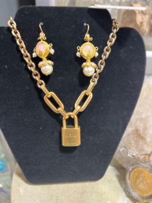 IKAT earrings and a beautiful Mark Edge necklace including a vintage Louis Vuitton lock and key.