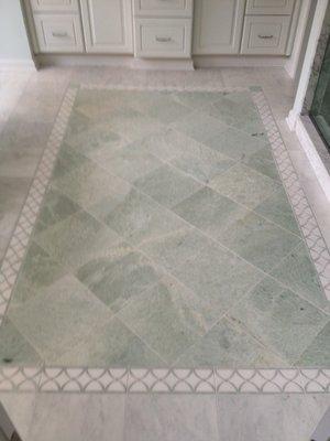 Design by Brinckerhoff Interiors              
 Floor tiles from:                                         Douro Granite & Marble, LLC