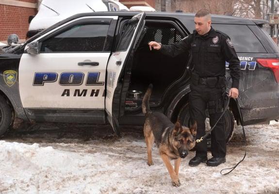 TJ with an adorable dog (K9 unit).