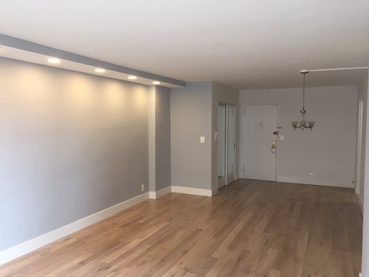 New hardwood flooring 2 inch drop ceiling with recessed lighting New base moldings in closet doors with mirrors installed.