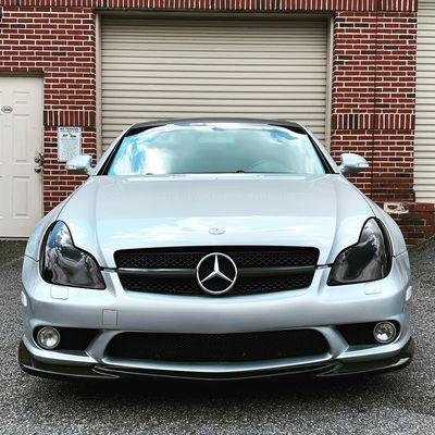 Mercedes with a custom look headlight tint Matte Black roof wrap