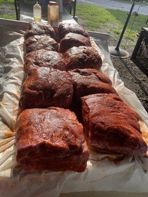 Butts getting some adjustments before their long journey of smoke and low heat.