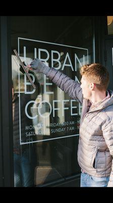 window cleaning at a local coffee shop