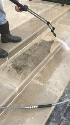 Pressure washing steps at a home in New Albany, Ohio