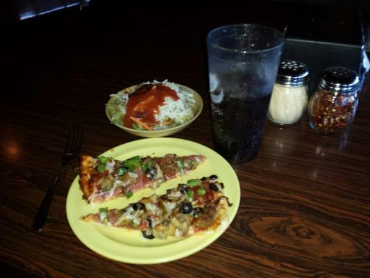 All you can eat thin crust pizza buffet, including salad and drink for only $6.75.