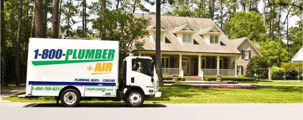 1-800-Plumber +Air Truck in front of a customer's home.