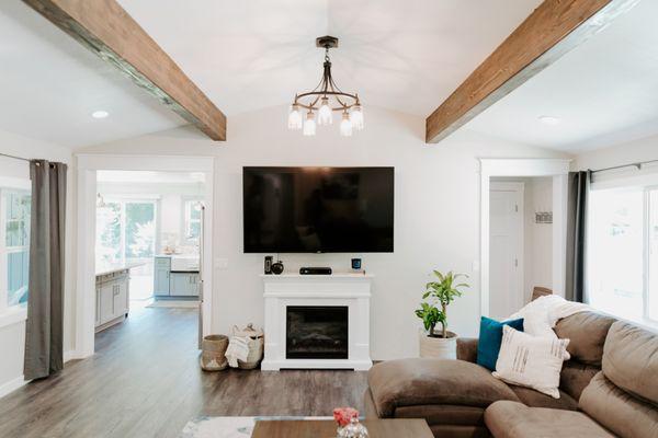 Don't be fooled by this gorgeous ceiling vault, it's a total fake.  We transformed this home without making any modifications to the roof!