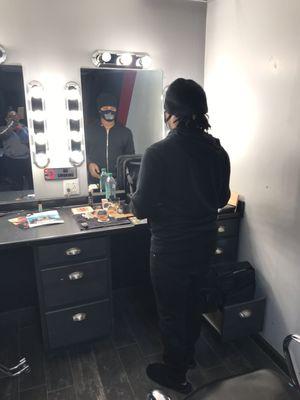 The corner of a nice sized dressing room and our MUA Kendrick Ramsey who is BOMB