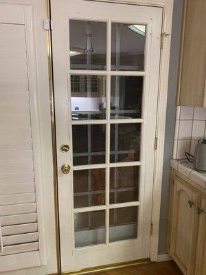 French door previously had five broken windows. This is an after shot of the finished product. Great work!