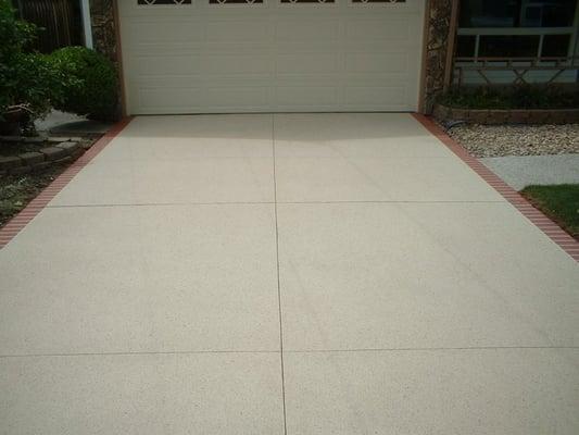 Concrete Overlay done on 20 year old cracked driveway.