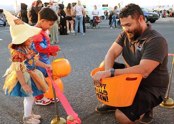 Serenity staff member, Luis attending the annual trunk or treat at Valley View Medical Center.